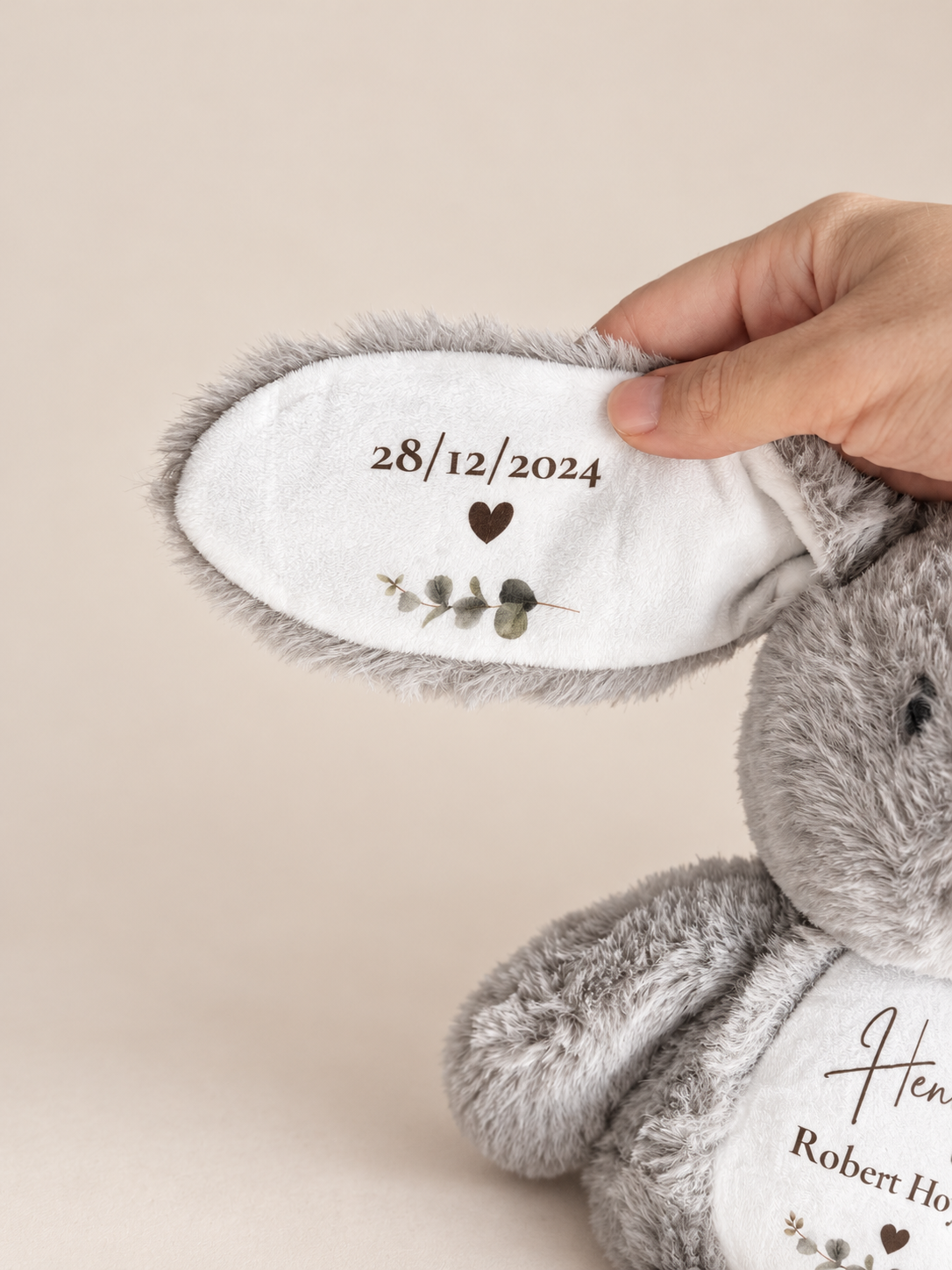 Close up of date of birth on bunny ear